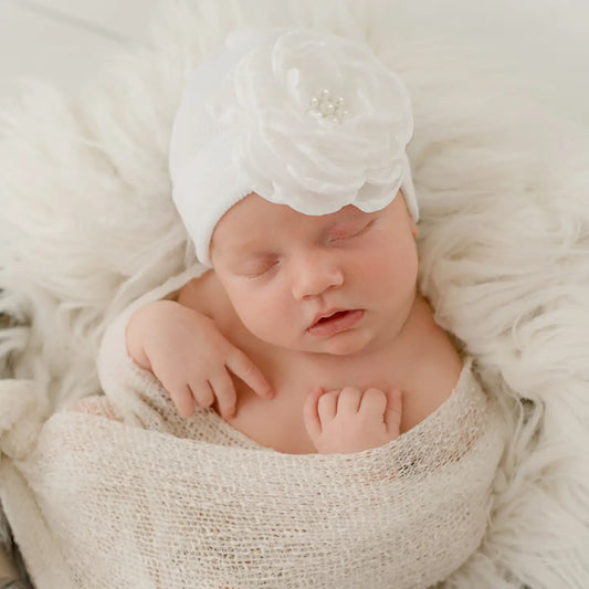 White Silk Flower with Pearl Center On White Hat 0-3m
